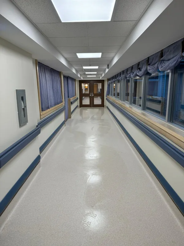 Long finished corridor with windows